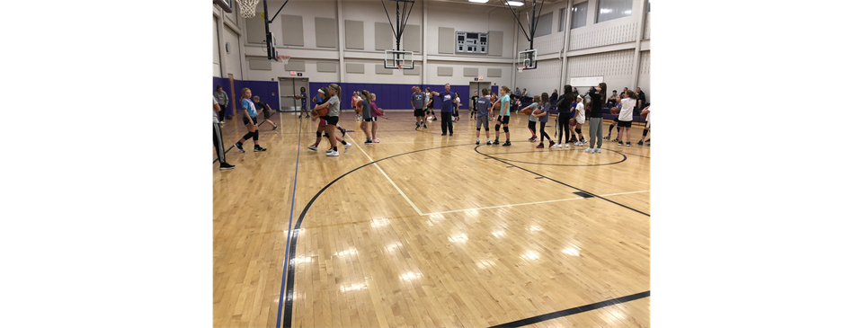 Coach Elsier attends girls clinics